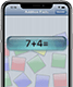 A thumbnail of an iPhone displaying a screen from RandoMeister showing the addition problem 7+4=.